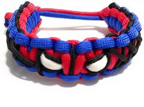 Create Your Own Superhero Paracord Bracelet - Iron Man 🔗 #EDCKnifeBeads #KnifeAccessories #EverydayCarry #EDC #GearCustomization #TacticalBeads #ParacordBeads #HandcraftedBeads #ArtisanBeads #KnifeCollecting #KnifeEnthusiast #GearUpgrade #UniqueBeads #FunctionalArt Spiderman Paracord Bracelet, Paracord Weaving, Create Your Own Superhero, Paracord Zipper Pull, Paracord Bracelet Designs, Paracord Crafts, Paracord Projects Diy, Paracord Accessories, Paracord Bracelet Patterns