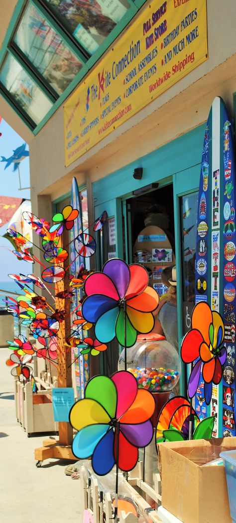 Kite shop on the Huntington Beach Pier. Very colorful! Photo by Jana Magnuson Kite Shop, Huntington Beach Pier, Beach Pier, Kites, Huntington Beach, Summer Fun, Quick Saves, Color, Art