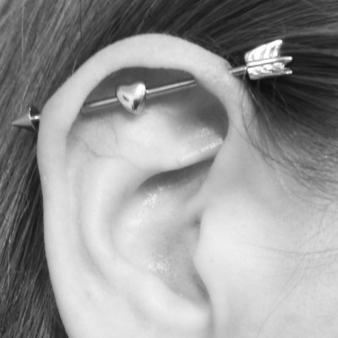 My industrial piercing Arrow with a heart industrial bar Arrow Industrial Piercing, Industrial Piercing Small Ears, Industrial Piercing Heart, Industrial Piercing Separate Earrings, Bar Ear Piercing, Ear Piercings With Industrial Bar, Industrial Bar Earring Heart, Cute Arrow, Cupids Bow