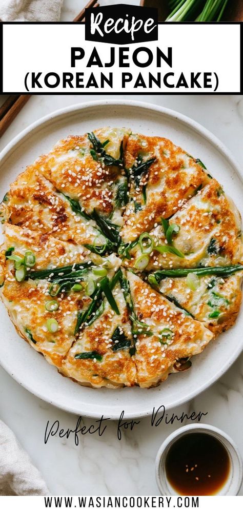 A plate of Pajeon, a Korean pancake, golden and crispy, topped with fresh green onions, shrimp, and sesame seeds, served with dipping sauce for a savory and flavorful dish. Healthy Korean Meals Aesthetic, Korean Scallion Pancake Recipe, Crunchy Dinner Recipes, Veg Korean Recipes, Easy Korean Pancake Recipe, Korean Veggie Pancake, Vegetarian Korean Recipes, Korean Recipes Easy, Korean Bbq Side Dishes