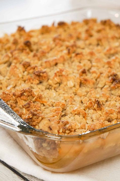 Apple Crumble is a delicious fruit dessert with a base of apple pie filling with a crunchy crumble topping with hints of citrus and cinnamon. Apple Pie Filling Desserts, Filling Desserts, Work Desserts, Cafeteria Recipes, Pie Filling Desserts, Canned Apple Pie, Croissant Recipes, Canned Apple Pie Filling, Apple Pie Bars