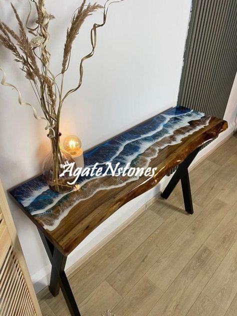 This is a Epoxy Resin Gaming or Trading Desk made with Walnut which is beautified with colored pigment . The resin river table is brand new and the contemporary design would be a unique addition to your home. With its perfect combination of style and function this piece of furniture is sure to be the star of any room. This modern table will also make for an awesome gift for your friends or relatives. Each one is created with high quality resin and individually handcrafted. Resin is a highly refl Live Edge Console Table, Resin Arts, Epoxy Wood Table, Wood Resin Table, Furnitur Ruang Keluarga, Resin Table Top, Epoxy Table Top, Ocean Resin, Epoxy Table