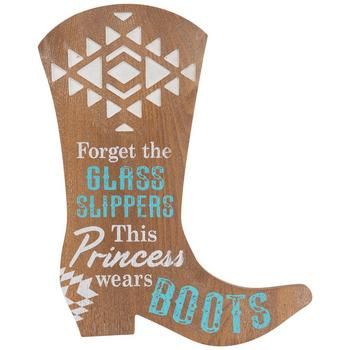 Dimensions: 15.56" H x 11.75" W x 0.5" D Material: MDF Shape: Novelty Color: Brown, White & Turquoise Orientation: Vertical Includes: 2 - Keyhole Slots Quantity: 1 Honor the western royalty that rules in your farmhouse with accents like this Princess Boot Wood Wall Decor displayed around her room. This piece is shaped like a cowgirl boot and has been embellished with distressed white and turquoise lettering. It comes complete with a southwestern emblem carved onto the top of the shoe and the hee Cowgirl Bedroom Ideas, Western Style Living Room, Cowgirl Decorations, Cowboy Boot Crafts, Horse Room Decor, Vintage Western Decor, Cowgirl Room, Horse Room, Antique Booth Displays