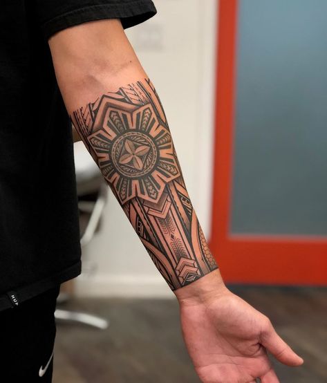 Forearm wrap for Myles! Filipino sun is healed from earlier this year. Currently booking for January. If you’re interested or have any… Filipino Tattoos Men Sun, Filipino Tribe Tattoos Men, Filipino Tattoos Men Forearm, Filipino Arm Tattoo, Filipino Forearm Tattoo, Four Arms Tattoo For Men, Filipino Tattoos Men, Filipino Star Tattoo, Philippines Sun Tattoo