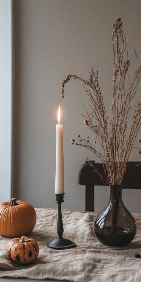 Elevate your space with minimalist Halloween decor that's both spooky and stylish. Embrace clean lines and monochromatic palettes for a chic autumnal atmosphere. Less is more when it comes to creating an eerie ambiance that's subtle yet impactful. Discover how simple shapes and carefully chosen accents can transform your home into a hauntingly beautiful sanctuary this season. October Games, Minimalist Halloween Decor, Witches Of East End, Minimalist Halloween, Monochromatic Palette, Chic Halloween, Creative Costumes, Hauntingly Beautiful, Practical Magic