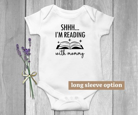 Book Baby Bodysuit, Reading With Mommy, Future Bookworm, Funny Baby Clothes, Cute Baby Outfit, Nerd Baby, Newborn Outfit, Baby Announcement Description -96% cotton 4% elastane -very soft feel -Roly Sport -Sublimation transfer - Print care instructions: - Machine wash at 30 degrees, inside-out, gentle cycle with mild detergent and similar colors. - Cool iron inside-out if necessary. - Do not dry clean. Shipping: All garments are hand printed to order so please allow 1 - 2 business days before shi Nerd Baby, Funny Baby Clothes, Book Baby, Clothes Cute, Newborn Outfit, Baby Newborn, Baby Outfit, Funny Baby, Neutral Baby