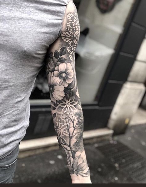 Flower Tattoos Sleeve Men, Men’s Floral Sleeve Tattoo, Flower Tattoo Men Arm, Men’s Flower Tattoo, Flower Sleeve Tattoo Men, Floral Tattoo Design Men, Mens Flower Tattoo, Flowers Tattoo Men, Nature Themed Sleeve Tattoo