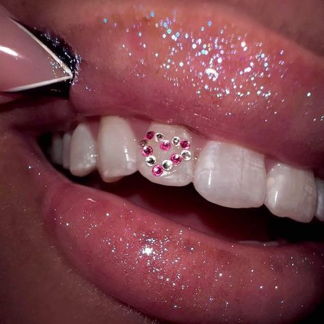 Tooth Gems Ideas Cross, Simple Teeth Gem Ideas, Flower Tooth Gem, Tooth Gems Heart, Tooth Gem Designs, Tooth Gems Ideas, Y2k Teeth Gems, Rine Stone On Teeth, Fairy Dust Tooth Gem