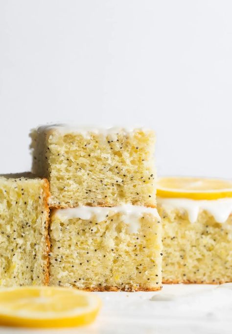 This easy lemon poppy seed cake recipe is bursting with bright citrus flavor and topped with a sweet vanilla glaze. A must bake for lemon lovers! | Browned Butter Blondie Lemon Poppyseed Cake Butternut Bakery, Broma Bakery Lemon Poppyseed, Lemon Poppy Seed Mini Bundt Cake, Zucchini Lemon Poppy Seed Cake, Lemon Poppyseed Cake Recipe, Easy Lemon Poppy Seed Cake, Lemon And Poppy Seed Loaf, Poppy Seed Cake Recipe, Lemon Poppy Seed Cookies