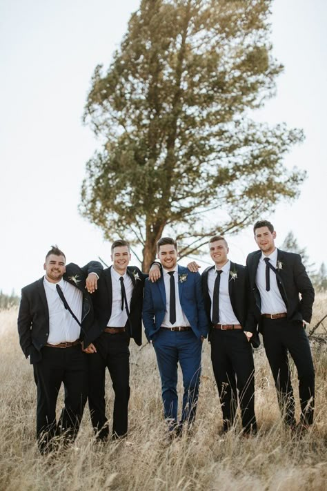 Groom In Navy Groomsmen In Black, Navy And Black Wedding Party, Navy Blue Groomsmen Suits Color Combos, Black Groomsmen Suits, Navy Groomsmen Suits, Black Groomsmen, Groom Suit Navy, Navy Blue Groom, Blue Groomsmen Suits