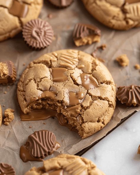 Sweet Peanut Butter Cup Cookies Indulge in the ultimate peanut butter lover’s dream with these Sweet Peanut Butter Cup Cookies! Combining a soft and chewy peanut butter cookie base with ... Read more Recipes Using Peanut Butter Cups, Big Peanut Butter Cookies, Reese's Peanut Butter Cup Cookies, Peanut Cookie, Cookie Peanut Butter, Peanut Butter Biscuits, Recipes Unique, Cookies Peanut Butter, Butter Desserts