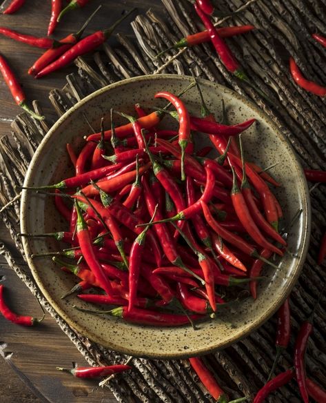 When you say Thai chillies, most people think 'birds eye' but there are in fact over 79 different varieties of Thai chilli peppers ranging in spice levels 🌶️🔥 With that many choices, it's easy to get confused about which ones to use; that's why on our blog we share the most common Thai chillies and which ones you should use according to your heat tolerance, check it out via the link in our bio! 😉 #thaichillies #chillilovers