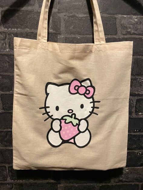 Sanrio Tote, Hello Kitty Tote Bag, Handpainted Tote, Diy Tote Bag Design, Hello Kitty Tote, Painted Canvas Bags, Handpainted Tote Bags, Pretty Tote Bags, Totes Ideas