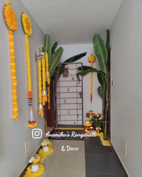 Welcoming Ganpati Bappa into our hearts and home with love and festive decor. Adorning the entrance with a lush Banana leaf Toran and a bright yellow-themed Rangoli, adding a touch of nature and warmth to his arrival. #GanpatiBappaMorya #BananaLeafDecor #YellowThemeDecor #FestiveVibes #GanpatiDecoration #NatureInspiredDecor #DivineDecor #EcoFriendlyDecor #GanpatiAtHome #TraditionalDecor #RangoliDesign #BananaLeafToran #GaneshChaturthiCelebration #HomeDecorIdeas #FestiveColors Leaf Toran, Banana Leaf Decor, Diwali Decorations At Home, Diwali Decor, Yellow Theme, Eco Friendly Decor, Nature Inspired Decor, Ganpati Bappa, Festive Decor