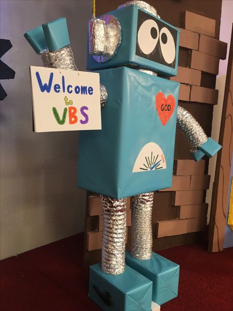 Robotics Decoration, I Wonder Vbs Decorations, Stem Decorations, Robot Classroom, Vbs Space, Computer Lab Decor, Science Lab Decorations, Maker Fun Factory Vbs, Cardboard Robot