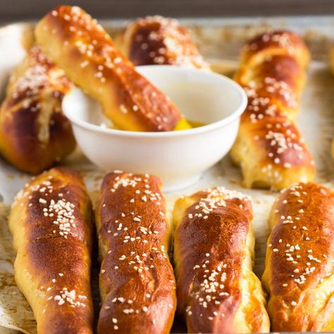 German Soft Pretzel Sticks - How to make homemade slightly sweet golden soft pretzel sticks. Made with yeast this makes enough for a crowd as an appetizer Soft Pretzel Sticks Recipe, Soft Pretzel Sticks, Bavarian Pretzel, German Food Authentic, Soft Pretzel Recipe, Oktoberfest Food, Homemade Pretzels, Homemade Soft Pretzels, Soft Pretzel