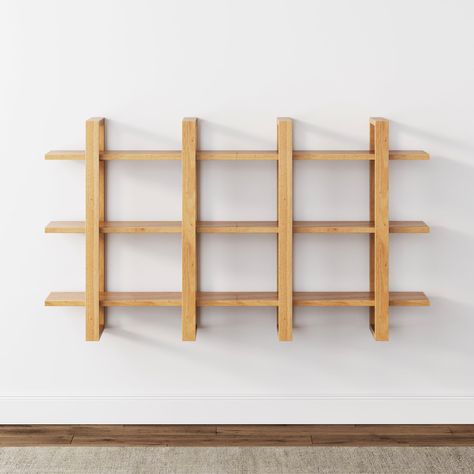 PRICES MAY VARY. This wall mounted bookshelf has a set of interior and exterior shelves, making it the a unique focal point in your living room or home office. If you're looking for a spacious floating wood shelf, Benji is the way to go. This floating shelf is a decor on its own-- assemble it vertically for a functional bookshelf or horizontally to make an exceptional statement piece. Benji is made from pure rubberwood and can carry up to 120 lbs. of weight. Easy 35-minute assembly and lifetime Wall Book Shelves, Modular Shelf, Tiered Display Shelves, Wood Floating Shelf, 4 Shelf Bookcase, Floating Bookshelf, Nathan James, Wall Mounted Bookshelves, Bookcase Wall