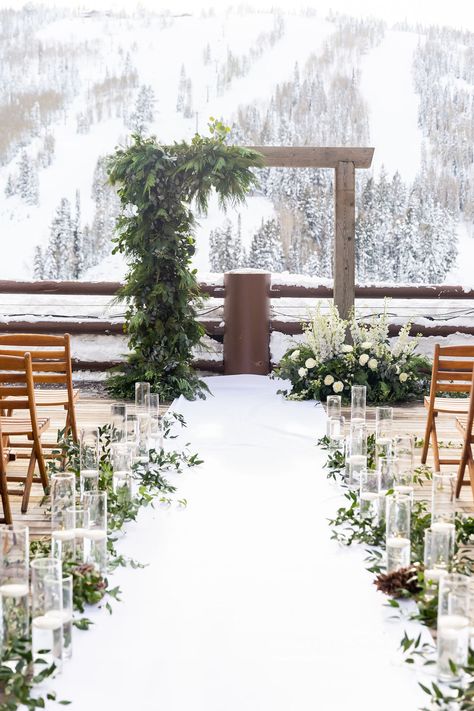 Winter greens, christmas greens, pine, eucalyptus asymmetrical ceremony arch - white delphinium, white rose Winter Ceremony Arch, Wedding Aisle Decorations Winter, Christmas Wedding Arbor Ideas, December Wedding Arch, Pine Arch Wedding, Pine Wedding Arch, Winter Wedding Arbor Ideas, Winter Wedding Alter Decor, Evergreen Wedding Arch