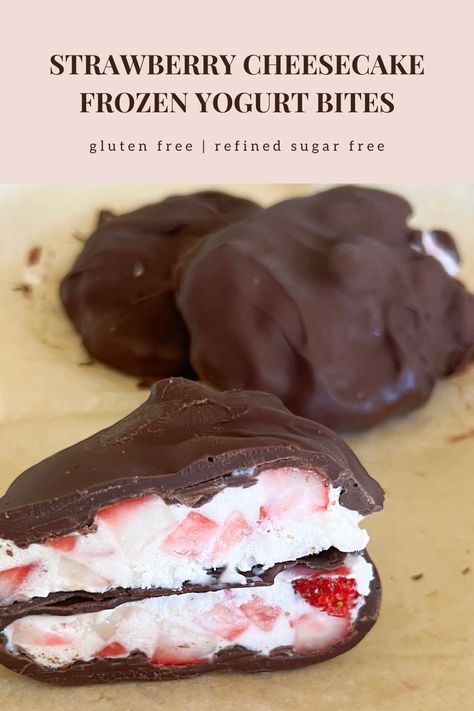 These healthy strawberry cheesecake frozen yogurt bites are gluten free, refined sugar free, can be dairy free, and are high protein. They're no bake and easy to make. A frozen yogurt bite is cut in half and shown sideways to see the inner and outer texture. Inside is creamy white with chunks of frozen pink strawberries poking through. The outside is a thick rich chocolate shell hardened and smooth. Keto Strawberry Cheesecake Bites, High Protein Strawberry Dessert, Low Carb Summer Desserts, Frozen Cheesecake Bites, Sugared Strawberries, Healthy Low Sugar Desserts, Healthy Strawberry Desserts, Strawberry Bites, Protein Ice Cream Recipes