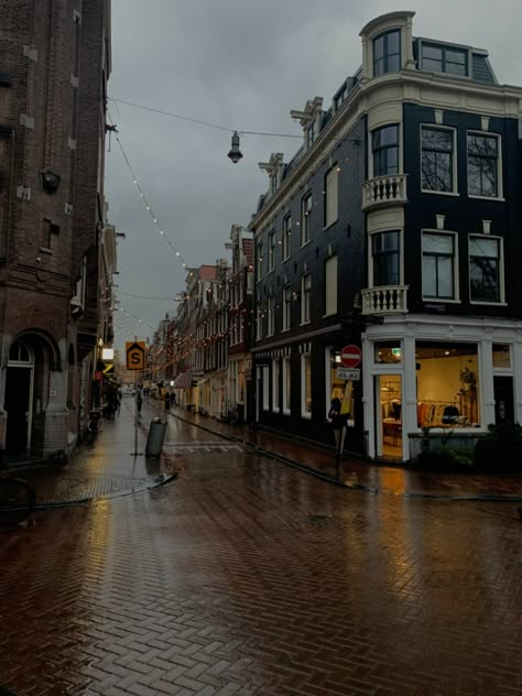 rainy, dark, buildings, street, vibe, lights, cloudy, grey Amsterdam Rainy Day, Amsterdam Street Photography, Amsterdam Night Life, Rainy Street Aesthetic, Rainy Amsterdam, Netherlands Aesthetic, Day In Amsterdam, Amsterdam Street, Rainy Street