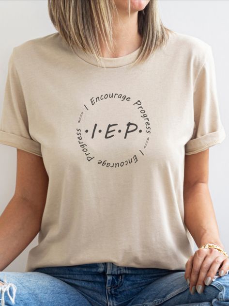 Wear your support for inclusion and neurodiversity with our "IEP I Encourage Progress" shirt! Perfect for Special Education teachers, Teacher Assistants, Paraeducators, and more. A great gift for those who support neurodivergent folks Special Ed Teacher Outfits, Special Ed Teacher Tshirt Ideas, Inclusive Teacher Shirts, Special Education T Shirts, Special Education Tshirt, Funny Special Education Teacher Shirts, Volunteer Teacher, Special Education Teacher Gifts, Teacher Aesthetic