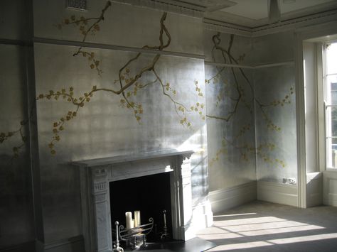 Silver leaf wall with painted detail. Throws a lovely light. Silver Leaf Wallpaper, Leaf Wall, Silver Leaf, Gold Leaf, Lincoln, Fireplace, Wall, Silver, Home Decor