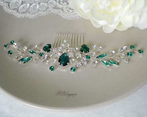 "This is an elegant and romantic ''Sigrid'' green crystal hair comb from our wedding accessories collection. The silver hair comb is made with emerald and clear rhinestones. An Emerald hair comb will be a perfect addition to many festive hairstyles for the green wedding. Each branch is flexible and can be moved to your liking. This green hair jewelry is the perfect accessory for brides, bridesmaids, Proms, and any special occasion. Available in silver and gold, measures approx. 7,6\" wide by 1,3 Emerald Green Hair, Emerald Hair, Festive Hair, Blue Wedding Hair, Crystal Hair Vine, Rhinestone Hair Comb, Royal Blue Wedding, Floral Hair Combs, Crystal Hair Comb