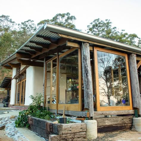 This small stone house in the woods is more than just a shelter; it is a sanctuary, a place where one can find solace in the embrace of nature, where the worries of the world melt away amidst the tranquility of the wilderness.

#NatureRetreat #RusticLiving #StoneHouse #ForestHome #OffGridLiving #WildernessEscape #SustainableArchitecture #SereneSanctuary #CozyCabin #WoodsyCharm Earth Home Design, Outdoor Compost Toilet, Cob House Exterior, Stone House In The Woods, Small Stone Cottage, Creative Lighting Ideas, Sustainable Architecture House, Cottage Building, Strawbale House