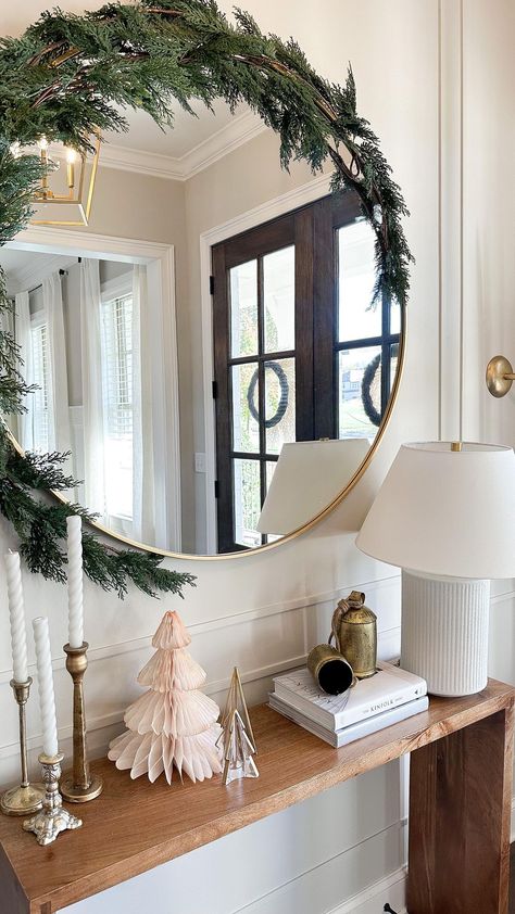 UPDATE: this exact garland is sold out now but I’ve linked similar options on LTK 🎄 Wondering how to get that trendy draped garland… | Instagram Christmas Pendant Light Decor, Christmas Mirror, Christmas Entry, Christmas Entryway, Silver Christmas Decorations, Christmas Apartment, Gold Ceiling, Command Hooks, Christmas Interiors