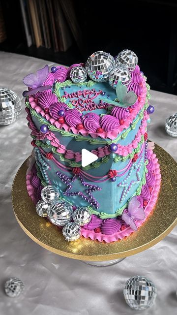 ALI GALA | VINTAGE CAKES on Instagram: "Had the most fun with this 13 Going On 30 cake! Inspired by ~the dress~ 🦋❤️  Over-the-top vintage cake with all the early 2000s bells & whistles. Featuring butterflies, disco balls, & hand-placed pearl stars. Seriously had a ball rewatching this movie & decorating this beauty!!!   #discosugar #13goingon30 #birthdaycake #birthdaypartyideas #rochesterny #rocny #vintagecake #cakeinspo" 2000s Themed Cake, 13 Going On 30 Decorations, 30 Flirty And Thriving Cake, 2000s Cake Ideas, 13 Going On 30 Cake, 13 Going On 30 Party Theme, 13 Going On 30 Party, Birthday Disco, Disco Cake