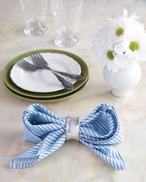 How To Tie Cloth Napkins, Folding Napkins With Rings Tutorials, How To Fold A Napkin Into A Bow, Napkin Folding Bow With Ring, Spring Napkin Folding Ideas, Spring Napkin Folds, Bow Tie Napkin Fold, Bow Napkin Ring, Cloth Napkin Folding With Ring