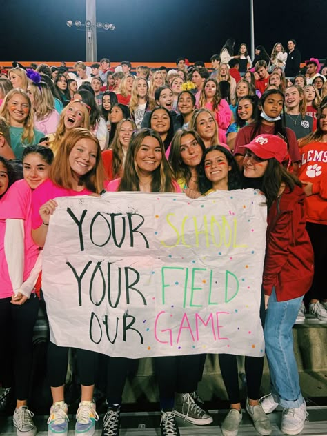 Neon Out Football Game Posters, Neon Pep Rally Signs, Neon Student Section Posters, White Out Football Game Signs, Football Season Posters, Athlete Vs Mathlete Spirit Week, Poster Ideas For High School Sports, Neon Football Game Theme Signs, Themes For Football Games High School