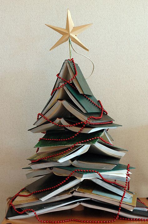 Another pretty Book Tree. Which would be your branches? Unusual Christmas Decorations, Unusual Christmas Trees, Book Christmas Tree, Book Tree, Alternative Christmas, Creative Christmas Trees, Alternative Christmas Tree, Unique Christmas Trees, Navidad Diy