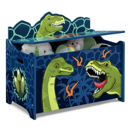 Kids will go wild for this Dinosaur Deluxe Toy Box by Delta Children. Full of prehistoric style, this toy box features colorful graphics of your child?s favorite dinosaurs, Tyrannosaurus rex and Brontosaurus. Constructed from durable wood, this sturdy storage piece is designed with rounded corners, smooth edges and a slow-closing lid for your little one's safety. Delta Children was founded around the idea of making safe, high-quality children's furniture affordable for all families. They know th Blue Dinosaur Room, Dino Bedroom Ideas, Dinosaur Toy Storage, Dinosaur Room Ideas, Kids Dinosaur Room, Toddler Boy Playroom, Dinosaur Toddler Room, Dinosaur Theme Room, Dinosaur Kids Room