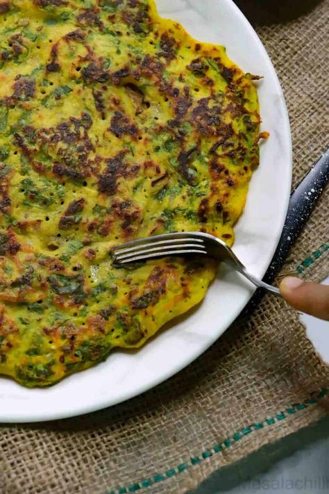 Moong Dal Chilla is a healthy, vegetarian, gluten-free and vegan Indian Pancake made with split yellow lentils, spinach and spices. These egg-free savory pancakes taste delicious when served with chutney and tomato ketchup. Serve as breakfast, pack for kids lunch box or serve as after school snack. Breakfast Pack, Dal Chilla, Moong Dal Chilla, Indian Pancakes, Yellow Lentils, Yellow Split Peas, Lentils And Rice, After School Snack, Savory Pancakes