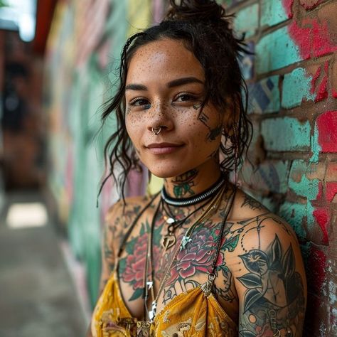 Portrait of a young woman with tattoos against a colorful graffiti wall, showcasing individuality and self-assuredness. Tattooed Woman Photoshoot, Tattoo Aesthetic Black Woman, Tattooed Black Women, Tattoo Photoshoot Ideas, Tattoo Photoshoot, Art Identity, Graffiti Background, Tattooed Woman, Tattooed Girls