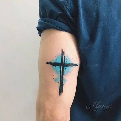 185+ Best Tricep Tattoo Designs (2023) - TattoosBoyGirl Cross Watercolor, Crucifix Tattoo, Tricep Tattoos, Cross Tattoo For Men, Music Tattoo Designs, Cool Forearm Tattoos, Cross Tattoo Designs, Religious Tattoos, Arm Band Tattoo