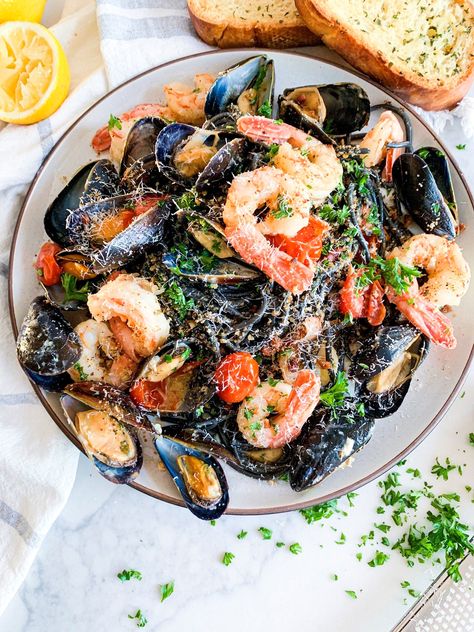 SQUID INK PASTA WITH SHRIMP & MUSSELS IN WHITE WINE - thecommunalfeast.com Squid Ink Pasta Recipe, Pasta With Lobster, Squid Pasta, Calamari Pasta, Pasta And Shrimp, Mussels In White Wine, Black Pasta, Ink Pasta, Pasta With Shrimp