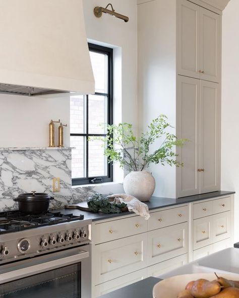 Marble Shelf In Kitchen, Stone And Marble Kitchen, Black Countertop Marble Backsplash, Marble And Quartz Kitchen, Concrete Countertops Marble Backsplash, Soapstone Perimeter Marble Island, Windows By Stove, Quartz Backsplash Kitchen Window, Quartz Backsplash With Shelf