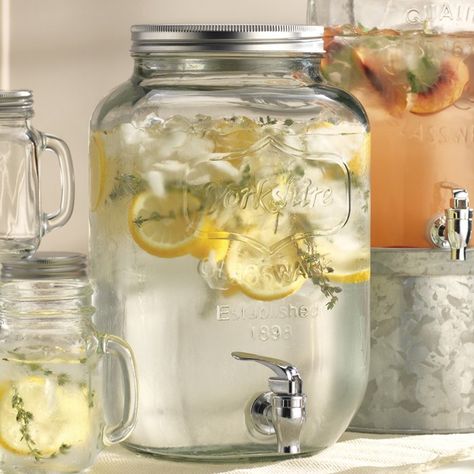 No Magnolia home is ready for the big reveal without lemonade in a pitcher like this mason jar beverage dispenser ($30). Mason Jar Drink Dispenser, Mason Jar Dispenser, Gallon Mason Jars, Mason Jar Drinks, Deep South Dish, Wine Dispenser, Make Simple Syrup, Beverage Dispensers, Beverage Dispenser