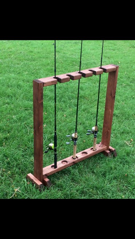 Fishing Pole Holder Fishing Pole Holder For Garage, Fishing Pole Holder Diy, Wood Fishing Rod Holder, Fishing Pole Holder Wood, Diy Fishing Pole, Diy Fishing Rod Holder, Diy Fishing Rod, Fishing Rod Stand, Bank Fishing Rod Holders