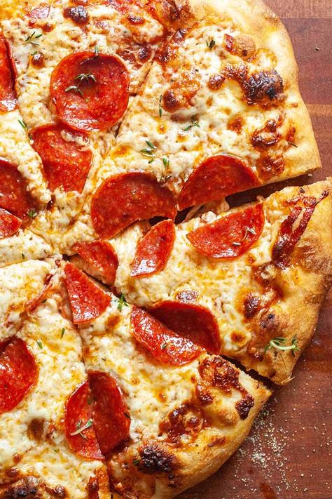 This Homemade Pepperoni Pizza has everything you want—a great crust, gooey cheese, and tons of pepperoni. The secret to great pepperoni flavor? Hide extra under the cheese! Who needs delivery? #homemadepizza #pepperonipizza #pizzarecipe #simplyrecipes Pizza Recipes Videos, Pizza Recipes Vegetarian, Cheese Pizza Recipes, Homemade Pepperoni, Homemade Pepperoni Pizza, Pizza Recipes Pepperoni, Reheat Pizza, Recipes Pizza, Quick Pizza