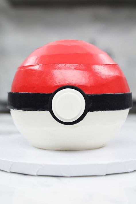 Pokemon Pokeball Cake | Nerdy Nummies | Rosanna Pansino Pokemon Ball Cake, Homemade White Cake Recipe, Pikachu Cake Ideas, Homemade White Cake, Pokeball Cake, Homemade White Cakes, Turntable Cake, Pokemon Birthday Cake, Pikachu Cake