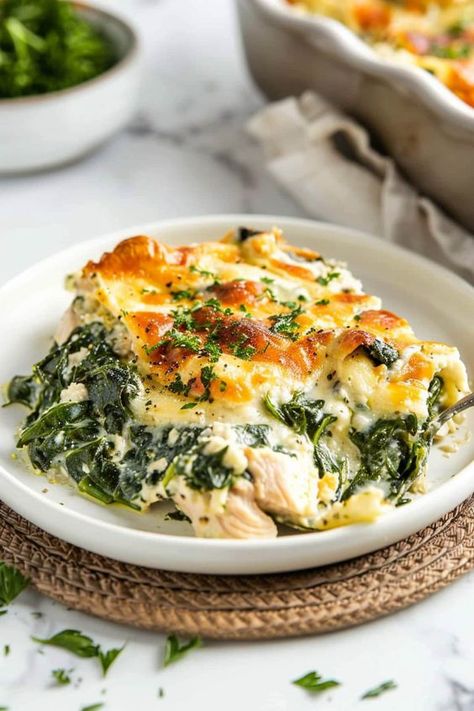 This chicken and spinach casserole with cream cheese is creamy and dreamy. And the golden, bubbly cheese on top makes everything better. Chicken Spinach Sweet Potato Recipes, Creamy Chicken And Spinach Casserole, Chicken Frozen Spinach Recipes, Rotisserie Chicken Spinach Recipes, Spinach Ricotta Bake, Lunch Casserole Recipes Healthy, Insanely Good Recipes, Dinner Casseroles Healthy, Creamy Spinach Recipes