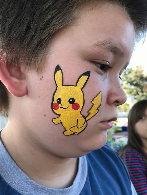 Pokémon Face painting Painting Ideas Pokemon, Pokemon Face Painting, Pikachu Face Paint, Simple Face Painting Ideas, Simple Face Painting, Painting Pokemon, Goku Face, Pokemon Faces, Face Painting Ideas