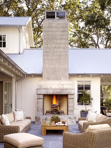 Lauren Leonard Interiors Fireplace Sitting Area, Farmhouse Exterior Design, Modern Farmhouse Exterior, House Hunters, Casa Exterior, Farmhouse Exterior, Outdoor Fireplace, Outdoor Rooms, A Fire