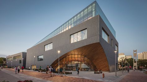 A curved wooden entrance is carved into the corner of this university library that Snøhetta has completed on Temple University's campus in Philadelphia. Elevation Plan, Temple University, Wooden Arch, University Library, Huge Windows, Library Design, Roof Garden, Reading Room, Green Roof