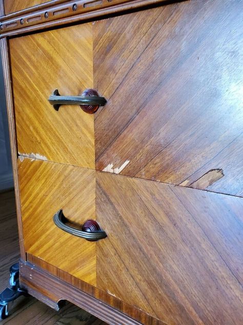 My client inherited this dresser from her great grandmother and wanted to be able to use it and perhaps later on use it in her nursery. Structurally it was solid. But had some veneer damage and just needed to be sanded and given a new finish. She wanted a modern clean look, so we went with white and wood look. I started sanding with my electric sander grit 120/220/320. Once the drawers, top and sides were sanded I applied this penetrating stain. Look at that gorgeous wo Veneer Dresser Makeover Diy, Art Deco Dresser Makeover, Antique Dresser Redo, Waterfall Dresser Makeover, Unfinished Wood Dresser, Art Deco Waterfall Dresser, Waterfall Furniture, Waterfall Dresser, Waterfall Vanity