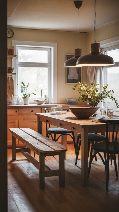 🍽️✨ Is there anything more inviting than a beautifully styled dining area? Imagine gathering with friends and family around a rustic kitchen bench, perfectly placed alongside an extendable BJURSTA table. This setup not only offers extra seating but also creates a warm and convivial atmosphere that makes every meal feel special. 🥰 I remember when I first set up my dining space; it was all about creating a cozy nook where laughter and good food could flow freely. The addition of INGOLF chair... Dinner Table With Bench, Ingolf Chair, Ikea Rustic, Bjursta Table, Cozy Dining Area, Ikea Bench, Kitchen Bench, Rustic Chair, Warm Lighting