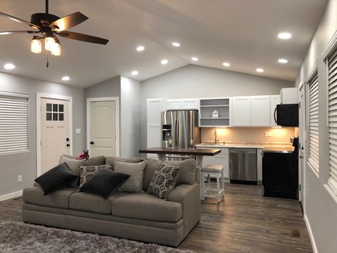 Our tiny home new build kitchen almost complete but decorative stuff. The cabinet's are kraftmaid from Lowe's . Couch and island are Ashley brand 💕💕 New Build Kitchen, Behind Couch, Shed To Tiny House, House Shed, New Build, Tiny Home, Remodels, New Builds, Staging